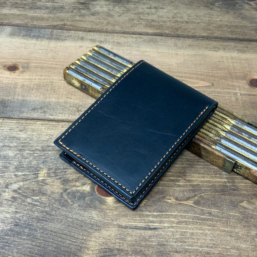 Winston All-Black with Black and Orange Cover